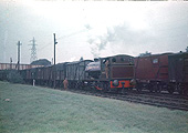 View of Cadbury Bournville 0-4-0ST No 10 shunting vent vans at Cadbury's exchange sidings on 12th October 1956