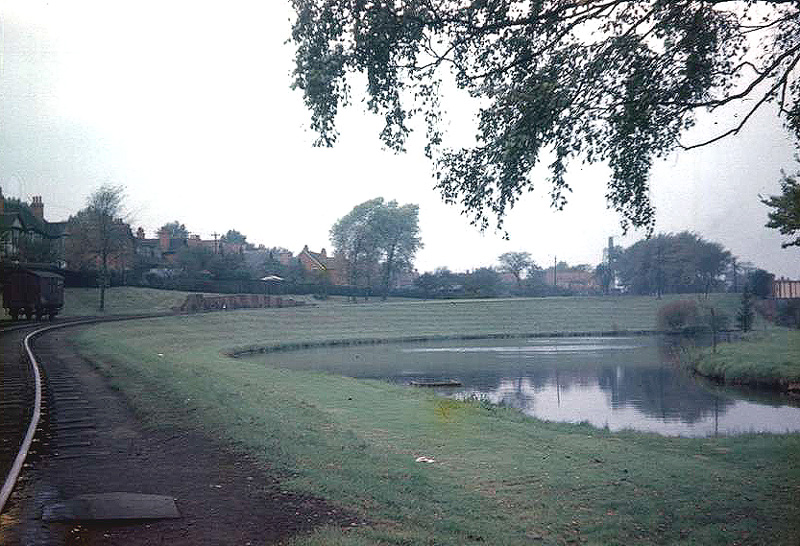 View of the curved approach to the bridge carrying Cadbury's railway over the West Suburban Railway to the Waterside complex on 12th October 1956