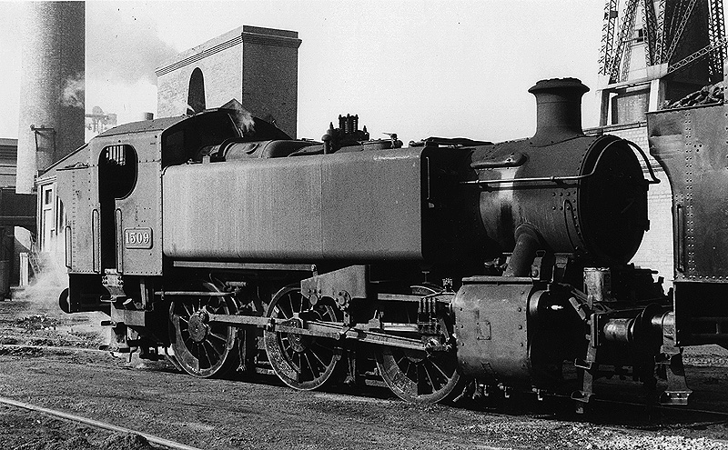 British Railways built 0-6-0T No 1509 is seen whilst in steam standing behind classmate No 1501 alongside the main shaft