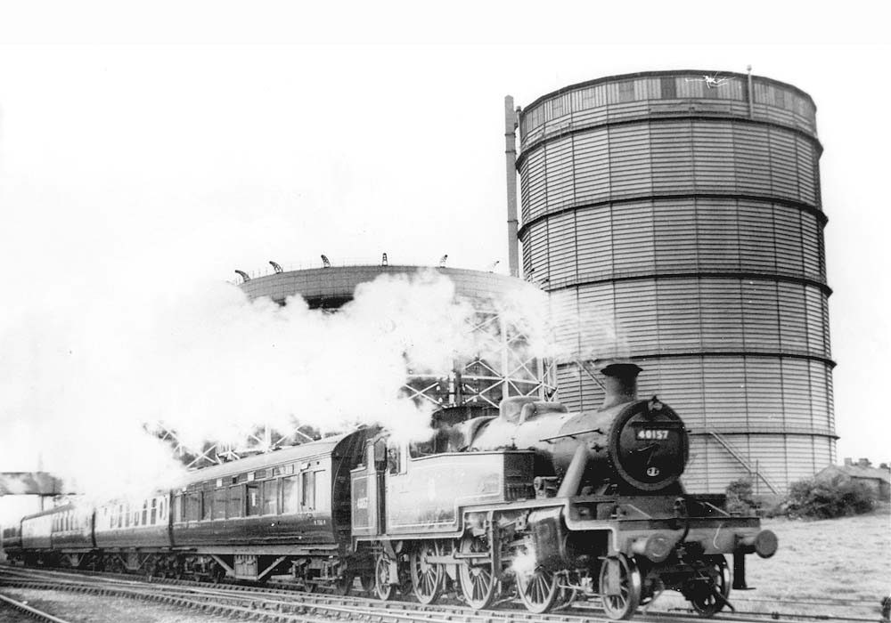 Ex-LMS 2-6-2T No 40157 is seen at the head of a five-coach service between Nuneaton and Coventry