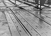 Close up showing the method of securing crossing timbers for road vehicles at Bedlam Lane crossing during the Winter of 1971