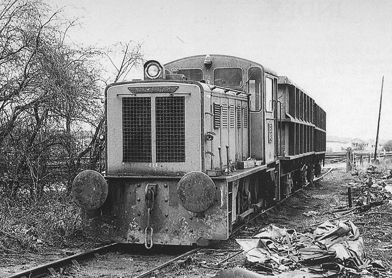 North British 0-6-0 Works No 27939 is seen moving wagons at G Cohen's scrapyard at Kingsbury on 9th April 1987