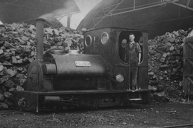Peckett 0-6-0ST 'Triassic' is seen standing alongside the coal point at Southam Cement Works