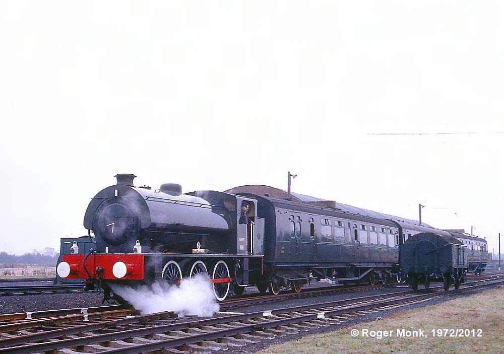In 1972 Army 98 ROYAL ENGINEER Hunslet 3798 of 1953 on a railtour train consisting of coaches normally used for internal personnel transport