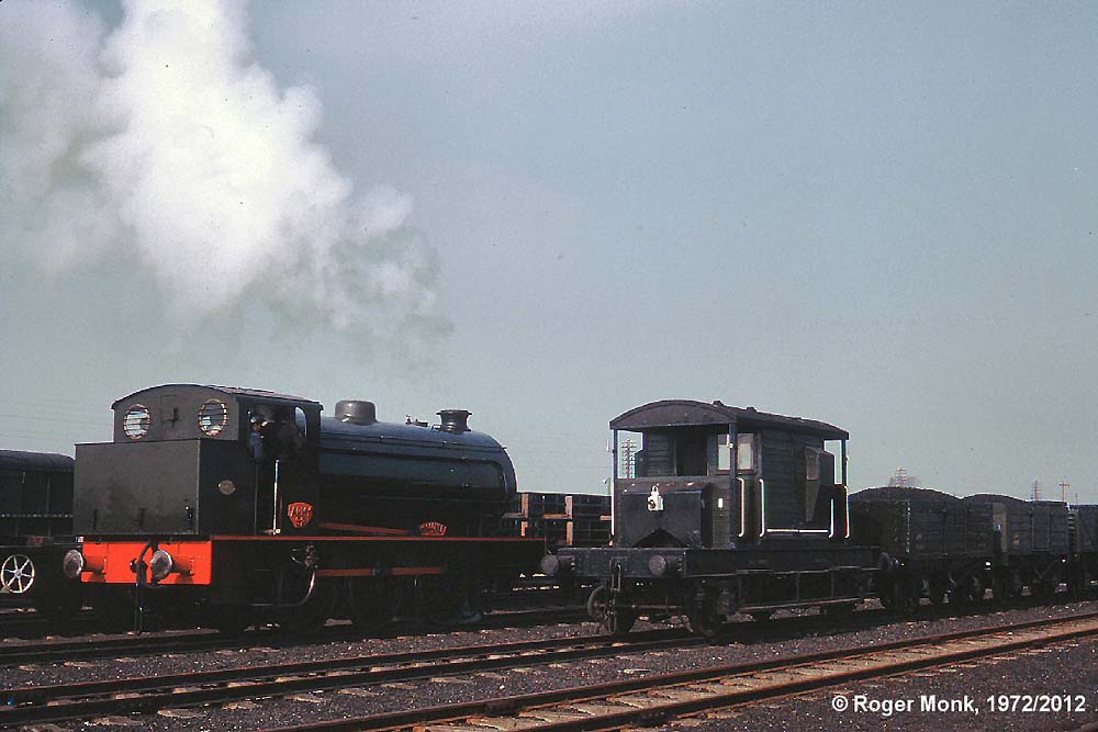 92 WAGGONER in the marshalling yard with an ex SR brake and internal user freight wagons