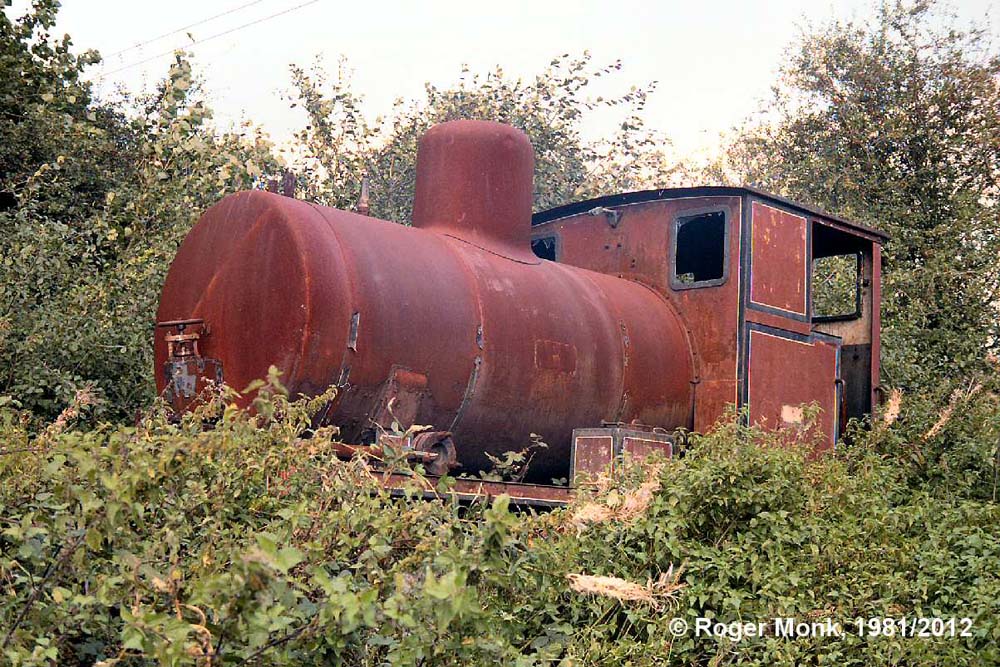 An ex CEGB Leicester Power Station Andrew Barclay (1772/1922) 0-4-0 Fireless loco dumped in the bushes. This loco was later retrieved for the Coventry Railway Centre at Bagginton � but believed to have been subsequently scrapped.