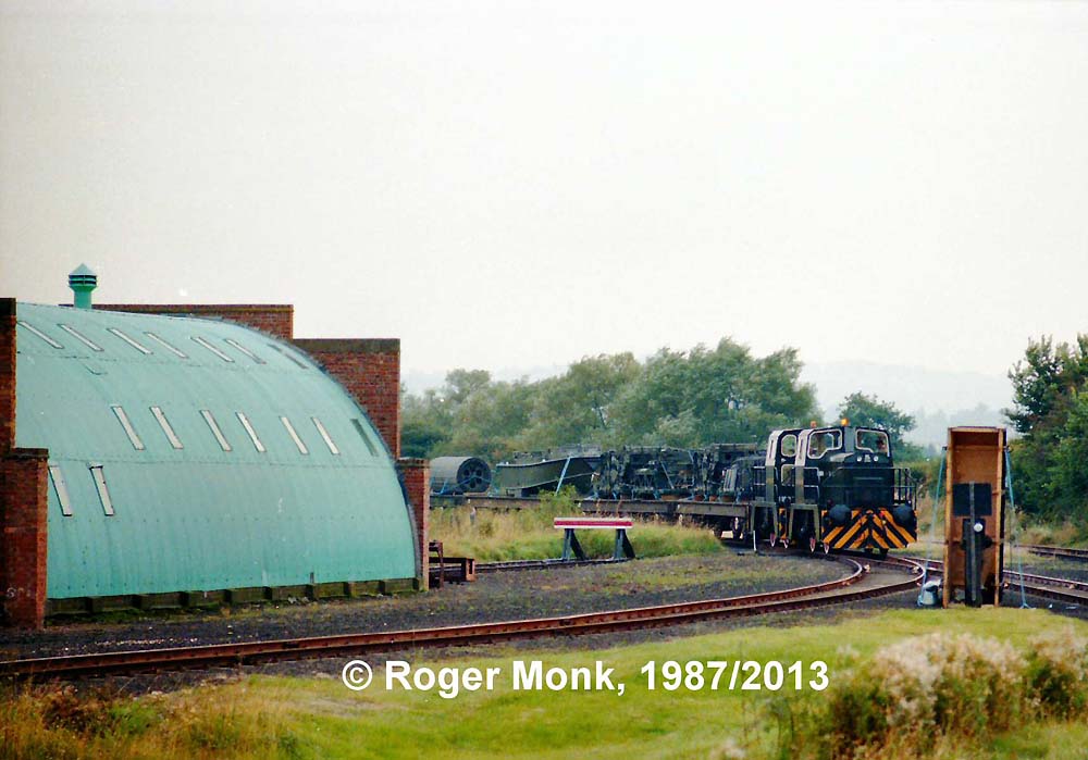 Two of the Army's Thomas Hill 'Vanguard' diesels, the normal Depot motive power in 1987, with a freight train