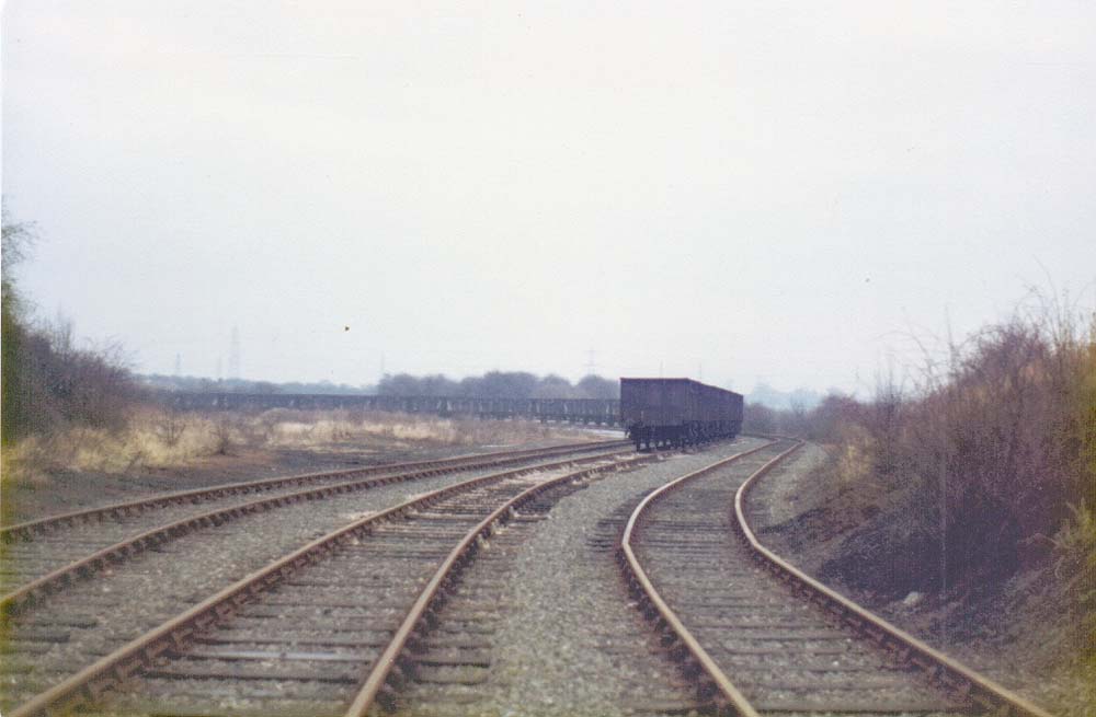 A 1980 view looking in the direction of Newdigate Colliery with just one of the three exchange sidings being used to stable steel bodied coal wagons