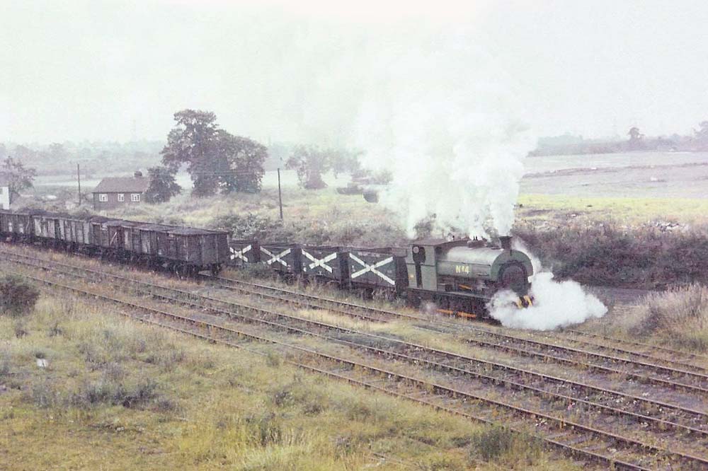 Newdigate's Peckett No 4 locomotives is seen lifting a rake of empty internal user wagons back to the colliery in the early 1960s