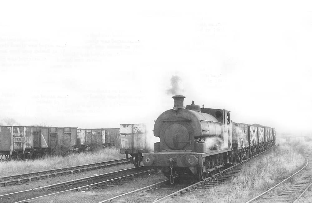 A Peckett is seen hard at work propelling wagons bunker first into the exchange sidings in late 1950s
