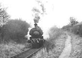 Newdigate Colliery's 0-6-0ST No 4 has just emerged from beneath the Coventry to Nuneaton Road bridge on its way back to the Colliery