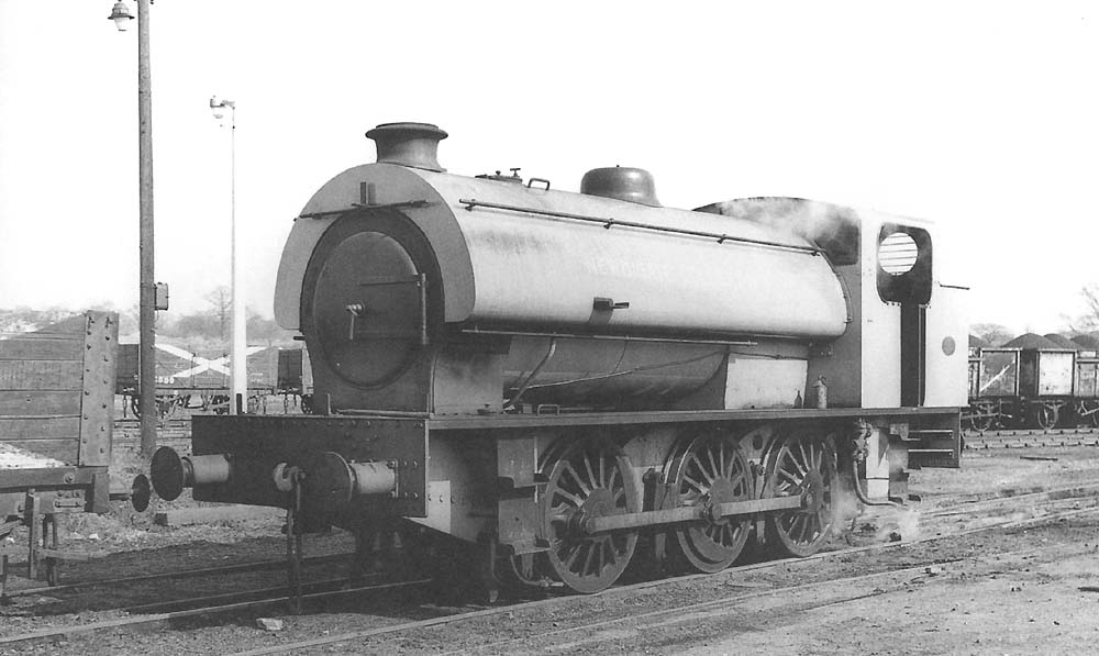 Hunslet 'Austerity' 0-6-0ST 'Newdigate Colliery No 1', its name can just read on the tank side, waits in the yard for its next turn of duty