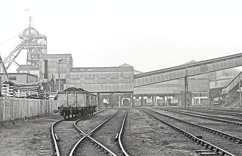 Looking towards the winding house, headgear on the left and the coal screens on the right with waste conveyor above