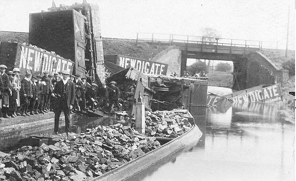 The fifth of a set of five photographs showing the result of wagons running away out of control, in this case into the canal
