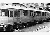 A photograph of the newly painted 1911 Daimler Railcar complete with white painted tyres and filler cap by the side of the buffer beam