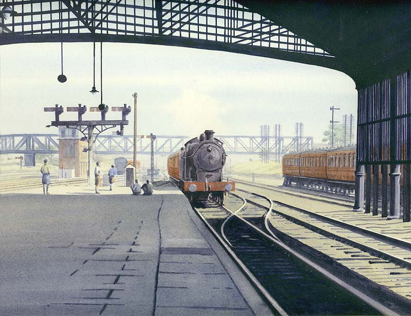 An unidentified George Fifth locomotive is seen arriving at Rugby station on a Northampton to Rugby service